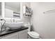 Modern bathroom featuring a vessel sink, stylish fixtures, and ample vanity storage at 4337 E Vaughn Ave, Gilbert, AZ 85234