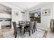 Bright dining area with modern table and chairs, large window and neutral tones at 4337 E Vaughn Ave, Gilbert, AZ 85234