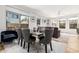 Open living space with dining area, comfortable seating, natural light, and stylish décor at 4337 E Vaughn Ave, Gilbert, AZ 85234