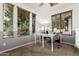 Bright home office featuring natural light from multiple windows and a modern desk setup at 4337 E Vaughn Ave, Gilbert, AZ 85234