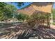 Community playground area with shade cover and play equipment at 4337 E Vaughn Ave, Gilbert, AZ 85234