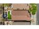 Aerial view of a home showcasing artificial turf, a patio, and a trampoline in the backyard at 4617 W Cottontail Rd, Phoenix, AZ 85086