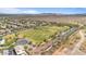 A vibrant community park featuring sports fields and playground areas, set amidst residential neighborhoods at 4617 W Cottontail Rd, Phoenix, AZ 85086