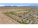 Sprawling residential area with red-tiled roofs nestled within a desert landscape, offering a tranquil setting at 4617 W Cottontail Rd, Phoenix, AZ 85086