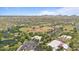 Aerial view of the baseball fields and park in a community with green landscaping, walking paths, and other recreational facilities at 4617 W Cottontail Rd, Phoenix, AZ 85086