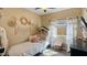 Charming bedroom featuring unique decor, a single bed, and bright natural light at 4617 W Cottontail Rd, Phoenix, AZ 85086