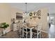 Charming dining area with stylish furnishings and decorative wall accents at 4617 W Cottontail Rd, Phoenix, AZ 85086