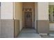 Covered front entryway with a decorative wreath adorning the brown front door at 4617 W Cottontail Rd, Phoenix, AZ 85086