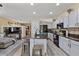 Open-concept kitchen flowing into the living area, ideal for entertaining and Gathering interaction at 4617 W Cottontail Rd, Phoenix, AZ 85086