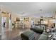 Spacious open-concept living room with wood floors and comfortable seating at 4617 W Cottontail Rd, Phoenix, AZ 85086