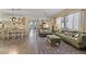 Open-concept living room connected to dining area and featuring modern decor at 4617 W Cottontail Rd, Phoenix, AZ 85086