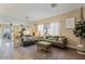 Inviting living room with wood floors, neutral walls, and comfortable seating at 4617 W Cottontail Rd, Phoenix, AZ 85086