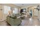 Comfortable living room with ample natural light, wood floors, and modern decor at 4617 W Cottontail Rd, Phoenix, AZ 85086
