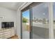 Balcony with view, adjacent to bedroom with sliding glass door and neutral colors at 4618 E Valley View Dr, Phoenix, AZ 85044