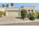 Charming home with a two-car garage and desert landscaping at 4618 E Valley View Dr, Phoenix, AZ 85044