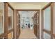 Open foyer with high ceilings, wood floors, and bright, airy living space at 4618 E Valley View Dr, Phoenix, AZ 85044