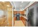 Efficient kitchen with granite countertops and wood cabinets at 4618 E Valley View Dr, Phoenix, AZ 85044