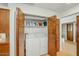 Bright laundry closet with a washer and dryer inside a single-Gathering home at 4618 E Valley View Dr, Phoenix, AZ 85044