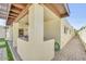 Covered outdoor kitchen with bar and walkway in a single-Gathering home at 4618 E Valley View Dr, Phoenix, AZ 85044