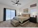 Cozy main bedroom with vaulted ceilings, ceiling fan and lots of natural light at 4633 E Desert Cactus St, Phoenix, AZ 85032