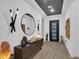 Inviting entryway boasts modern decor, stylish lighting, and sleek finishes, setting a sophisticated tone at 5951 N 190Th Dr, Litchfield Park, AZ 85340
