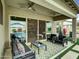 Inviting covered patio with modern furniture and access to pool area at 5951 N 190Th Dr, Litchfield Park, AZ 85340