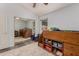 Comfortable bedroom featuring a loft bed with built-in storage and a cozy white rug at 632 W Natal Cir, Mesa, AZ 85210