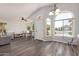 Bright and spacious living room with arched windows and ample natural light at 632 W Natal Cir, Mesa, AZ 85210