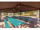 Shaded picnic area featuring picnic tables and access to playground equipment at 632 W Natal Cir, Mesa, AZ 85210