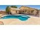 Stunning backyard with a pool and covered patio, ideal for outdoor living and entertaining at 632 W Natal Cir, Mesa, AZ 85210