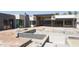 Modern pool construction with elegant tiling and multiple levels, offering a sophisticated outdoor living space at 7001 E Paradise Dr, Scottsdale, AZ 85254