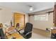 Office featuring carpet floors, desk, black office chair, and a window with natural light at 7240 W Grovers Ave, Glendale, AZ 85308