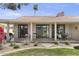 Inviting back patio with seating areas, lush greenery, and scenic views at 7552 N San Manuel Rd, Scottsdale, AZ 85258