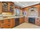Beautiful kitchen with custom cabinets, granite countertops, and stainless steel appliances at 7552 N San Manuel Rd, Scottsdale, AZ 85258