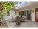 Charming covered patio area with skylights and comfortable seating for outdoor relaxation at 7552 N San Manuel Rd, Scottsdale, AZ 85258
