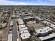 Aerial view of a community featuring townhomes and a pool with tennis courts at 811 W 13Th St, Tempe, AZ 85281