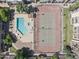 Aerial view of community pool, spa, and tennis court at this property at 811 W 13Th St, Tempe, AZ 85281