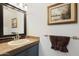 Bathroom featuring a vanity with a framed mirror and decorative framed painting at 811 W 13Th St, Tempe, AZ 85281