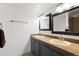Bathroom with double sink vanity, framed mirrors, and towel bar at 811 W 13Th St, Tempe, AZ 85281