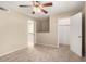 Cozy bedroom offering plush carpet, ceiling fan, and spacious closets at 811 W 13Th St, Tempe, AZ 85281