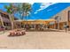 Inviting community area featuring picnic tables, charcoal grills and shade structure for gatherings and outdoor enjoyment at 811 W 13Th St, Tempe, AZ 85281