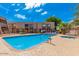 Community pool with ample lounge seating and lush landscaping at 811 W 13Th St, Tempe, AZ 85281