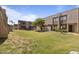 Exterior of townhomes with green space, trees, and walking paths at 811 W 13Th St, Tempe, AZ 85281
