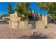 Los Prados townhomes with community watch sign in a well-maintained complex; speed limit 15, assigned parking enforced at 811 W 13Th St, Tempe, AZ 85281