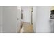 Bright hallway featuring tile flooring and a view of the front door at 811 W 13Th St, Tempe, AZ 85281