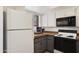 Functional kitchen with plenty of cabinet space and efficient appliances at 811 W 13Th St, Tempe, AZ 85281