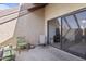 Cozy outdoor patio space with neutral colors, chairs, and view to exterior at 811 W 13Th St, Tempe, AZ 85281