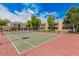 Community tennis court surrounded by lush greenery and residential buildings at 811 W 13Th St, Tempe, AZ 85281