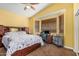 Bright bedroom featuring a ceiling fan, a built in desk, and lots of natural light at 829 S Roanoke St, Gilbert, AZ 85296