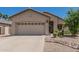 Charming single-story home featuring a two-car garage and well-maintained landscaping, promoting curb appeal at 829 S Roanoke St, Gilbert, AZ 85296